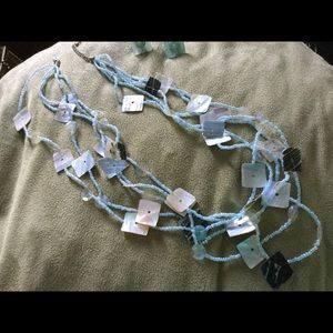Beaded light blue necklace and earrings